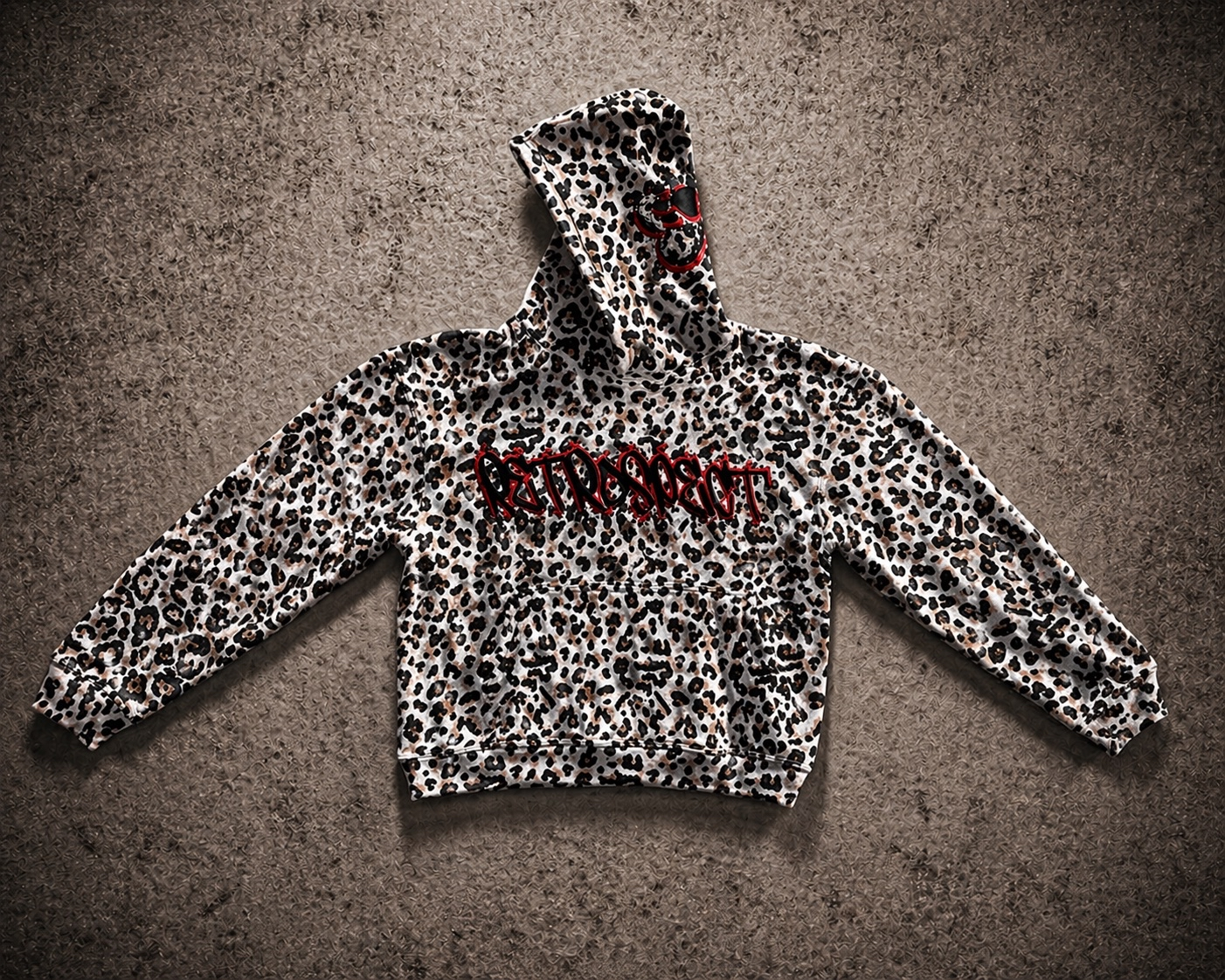Retrospect Bejeweled Cheetah Print Hoodie featuring a colorful cheetah pattern and sparkling jeweled accents on soft fabric.