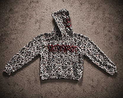 Retrospect Bejeweled Cheetah Print Hoodie featuring a colorful cheetah pattern and sparkling jeweled accents on soft fabric.